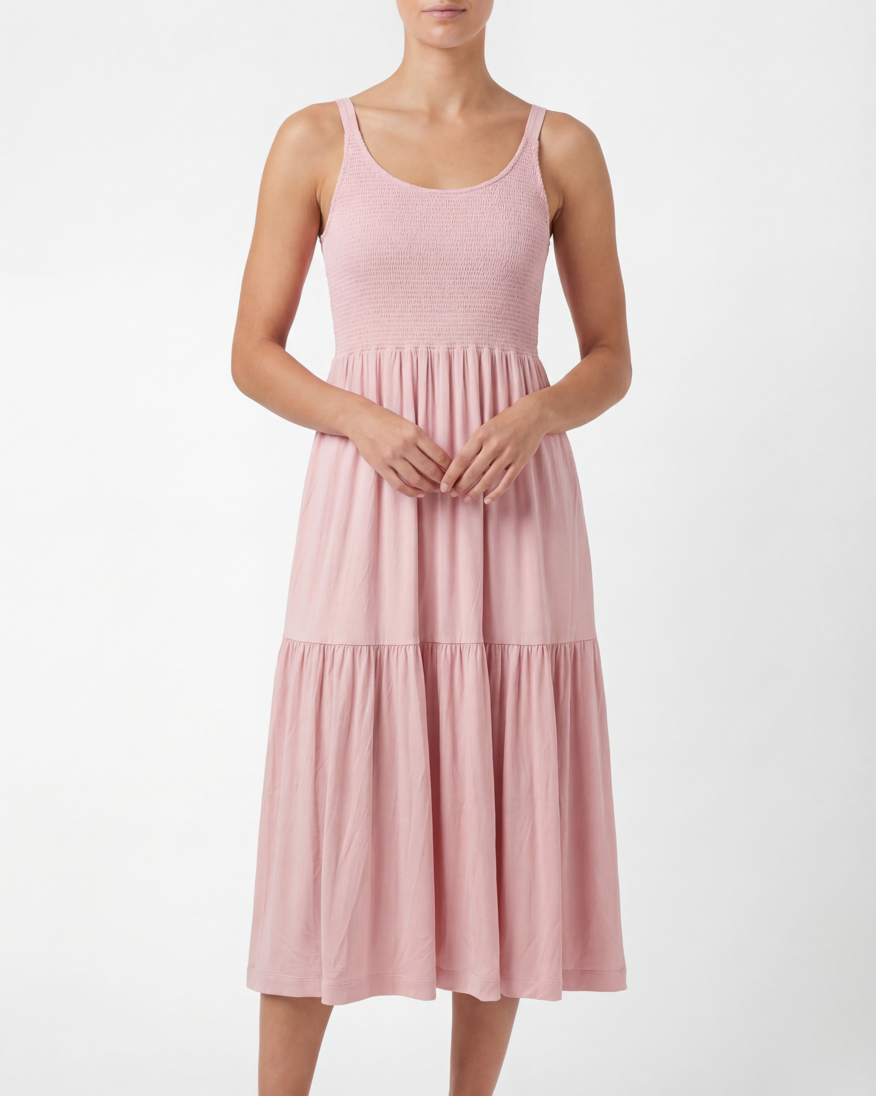 Pink dress worn by a person on a white background