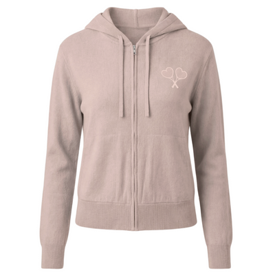 Pink hoodie with a logo on the chest against a white background