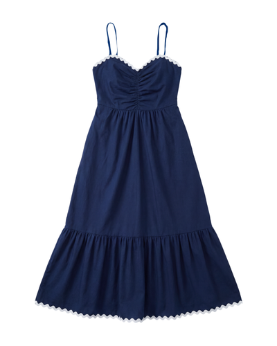 Navy blue dress with thin straps on a white background
