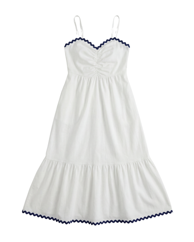 White dress with blue trim on a white background